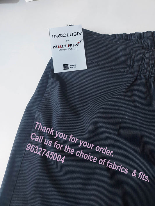 it is a black trouser with small stripes. the waist is with elastic for easy access. also on the left side of the trousers, there is a tag mentioning the brand INXCLUSIV by MULTIFLY. Thank you for your order, Call us for the choice of fabrics and fits, 9632745004 is written on the trouser pic from left centre slanting towards right bottom